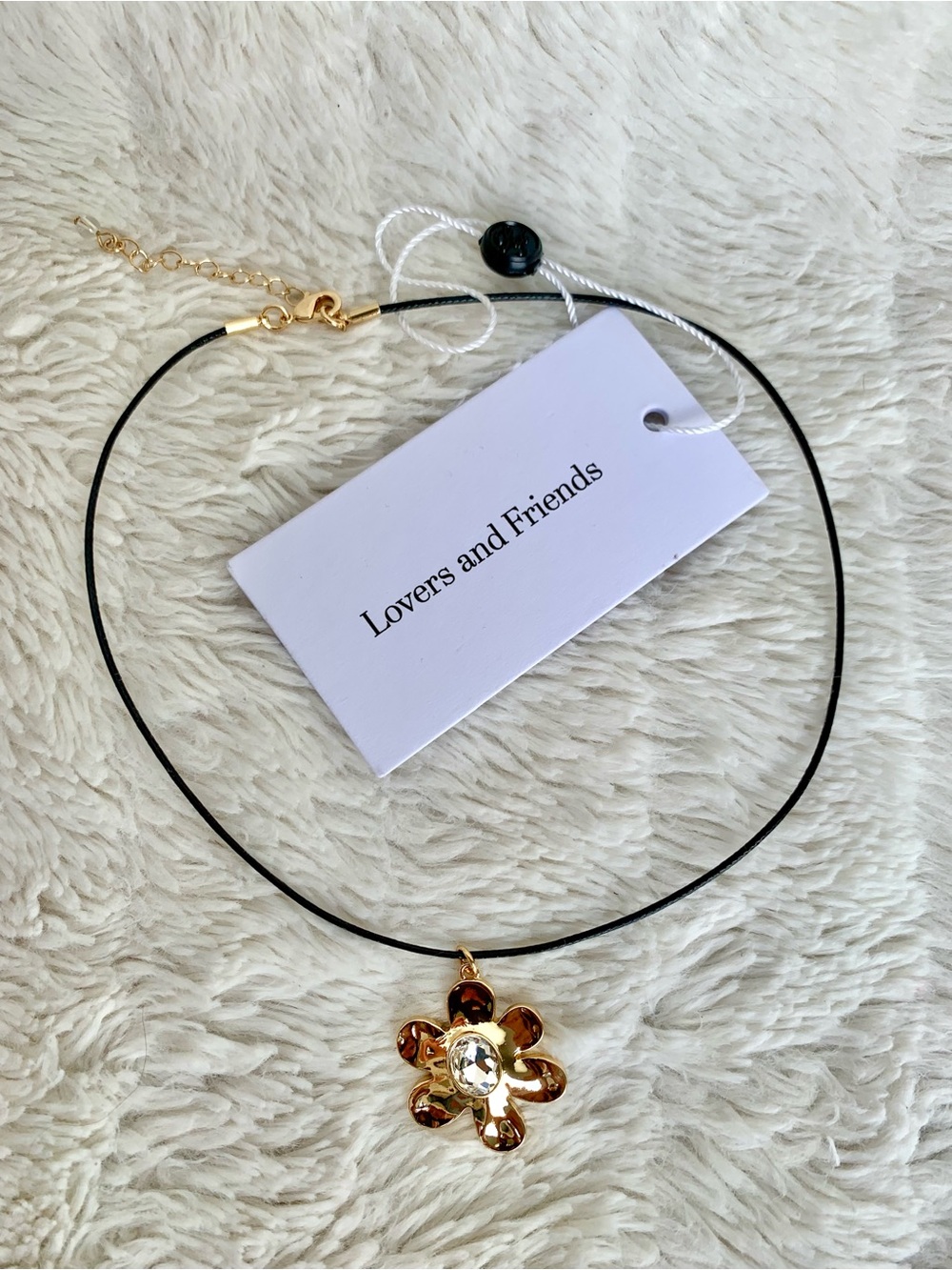 Lovers + Friends Black Cord Necklace with Gold Flower Charm